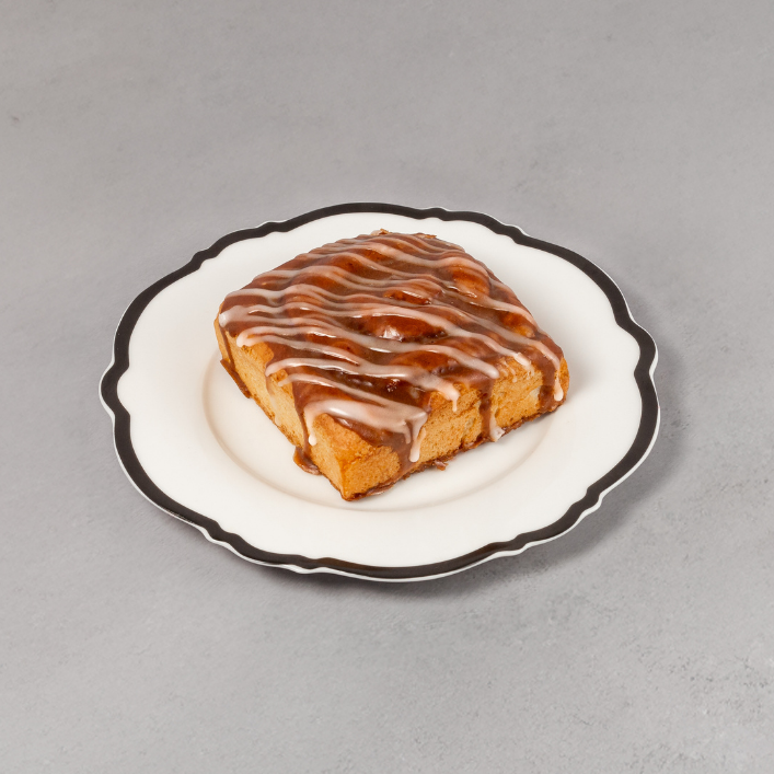 Small dessert on a decorative plate with a gray background