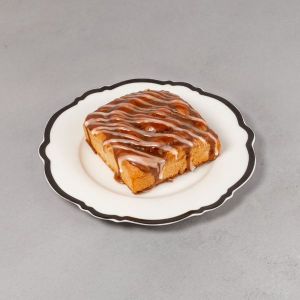 Small dessert on a decorative plate with a gray background