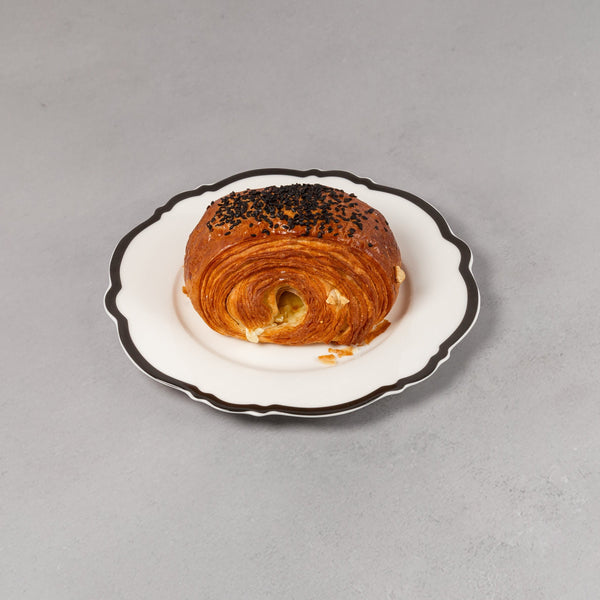 Pastry on a decorative plate with a gray background